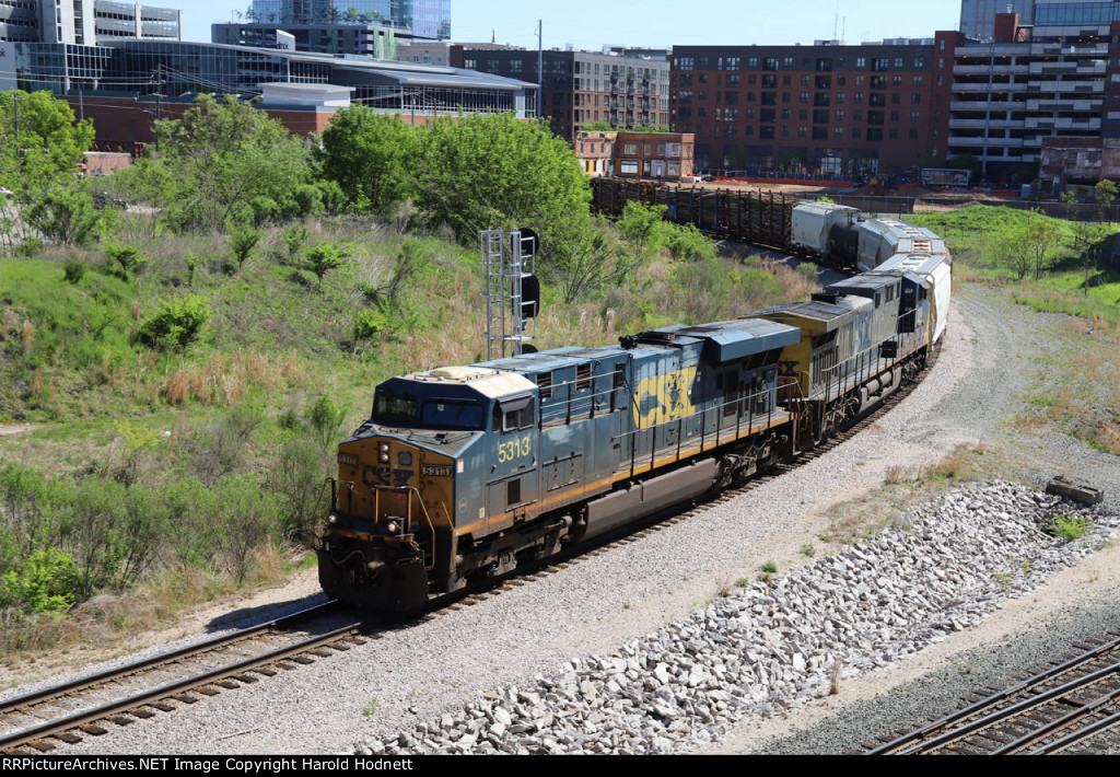 CSX 5313 leads train L619-13 at Raleigh tower